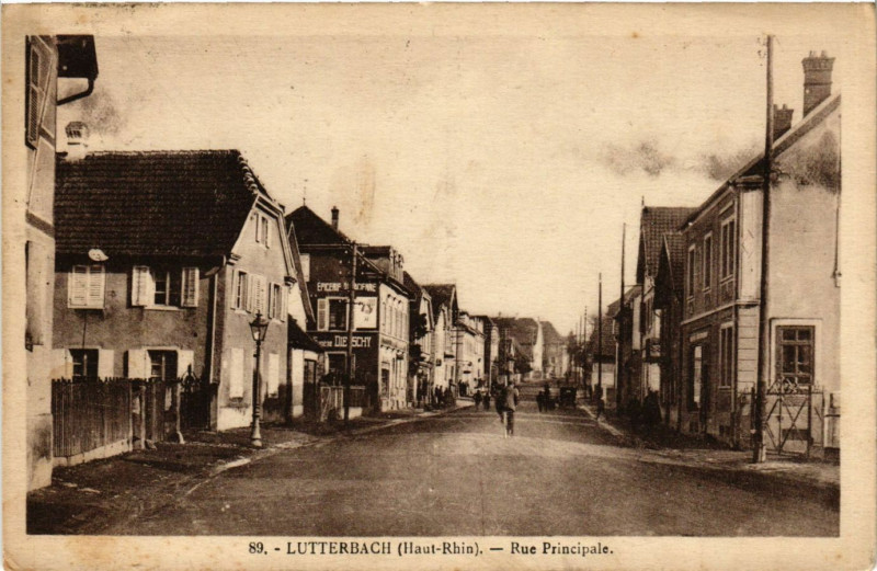 Carte postale ancienne Lutterbach - Rue Principale
