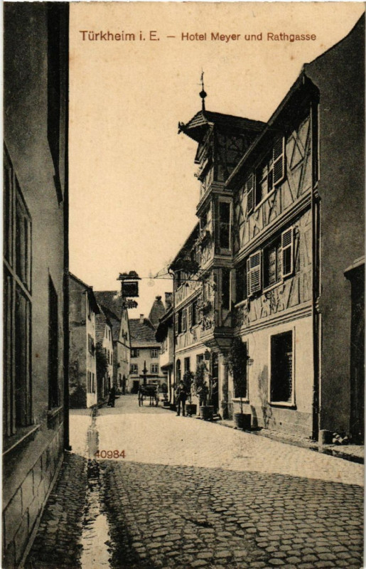 Carte postale ancienne Turkheim i. E. - Hotel Meyer und Rathgasse