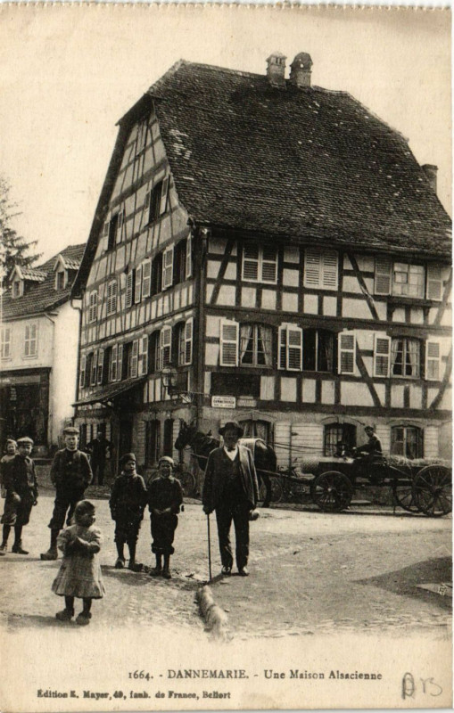 Carte postale ancienne Dannemarie - Une Maison Alsacienne à Dannemarie