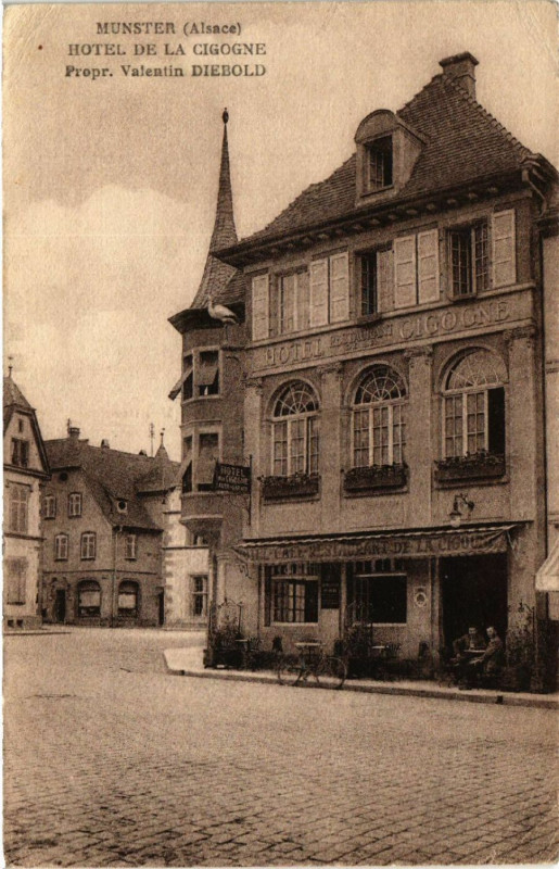 Carte postale ancienne Munster (Alsace) Hotel de la Cigogne Propr. Valentin Diebold à Munster