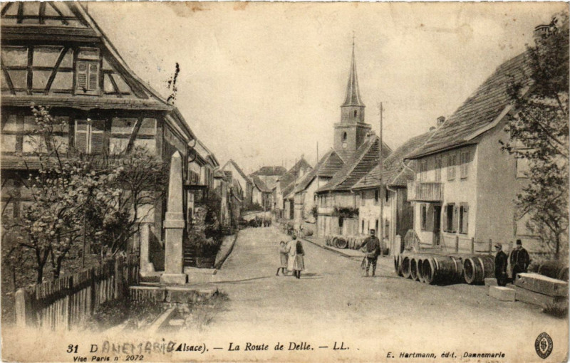Carte postale ancienne Dannemarie (Alsace) - La Route de Delle à Dannemarie