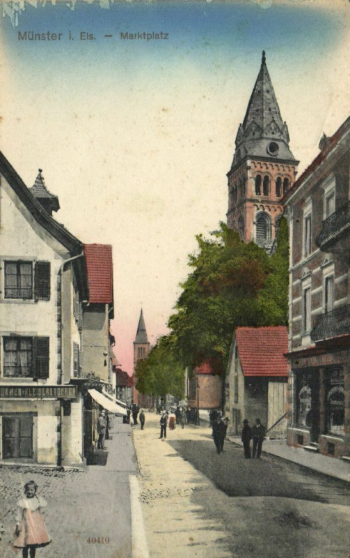 Carte postale ancienne Munster I.Eis. - Marktplatz à Munster