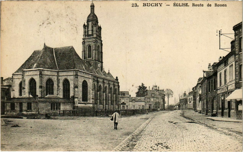 Carte postale ancienne Buchy - Eglise Route de Rouen à Buchy