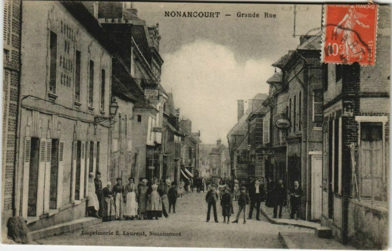 Carte postale ancienne Nonancourt-Grande Rue à Nonancourt