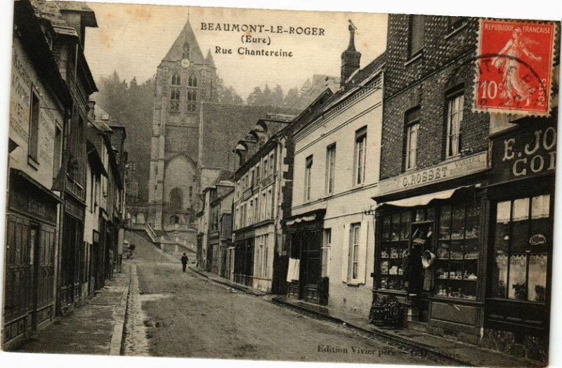 Carte postale ancienne Beaumont-le-Roger - Rue Chartraine à Beaumont-le-Roger