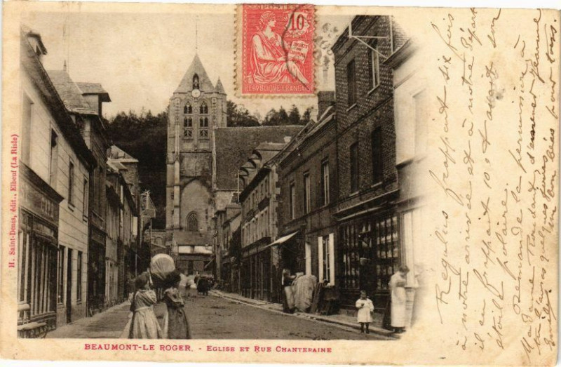 Carte postale ancienne Beaumont-le-Roger - Eglise et Rue Chartraine à Beaumont-le-Roger