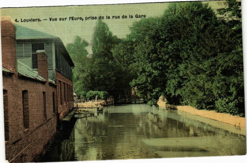 Carte postale ancienne Louviers - Vue sur l'Eure prise de la rue de la Gare à Louviers
