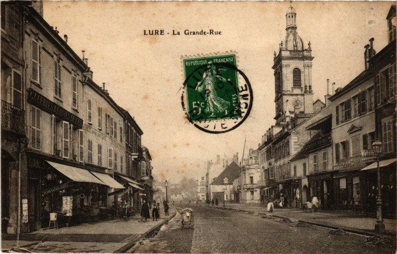 Carte postale ancienne Lure - La Grande - Rue à Lure