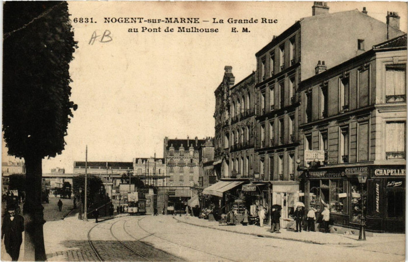 Carte postale ancienne Nogent-sur-Marne - La Grande Rue au Pont de Mulhouse à Nogent-sur-Marne