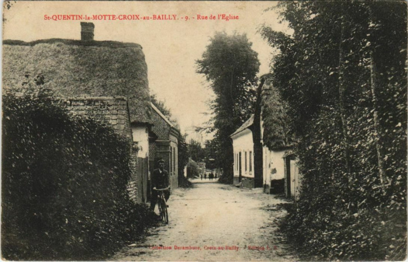 Carte postale ancienne Saint-Quentin-la-Motte-Croix-au-Bailly - Rzue de l'Eglise à Saint-Quentin-la-Motte-Croix-au-Bailly