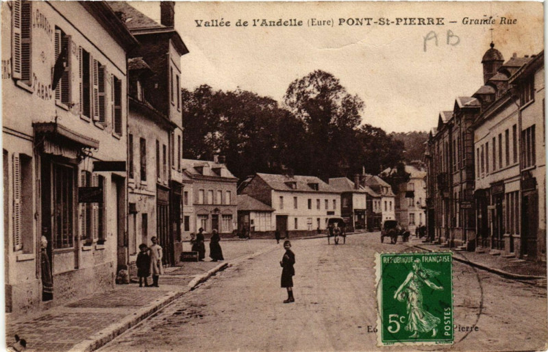 Carte postale ancienne Vallée de l'Andelle - Pont-Saint-Pierre - Grande Rue à Pont-Saint-Pierre