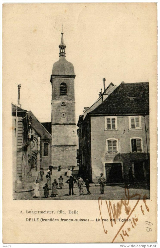 Carte postale ancienne Delle La rue de l'Eglise à Delle