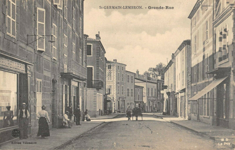 Carte postale ancienne Saint Germain Lembron Grande Rue à Saint-Germain-Lembron