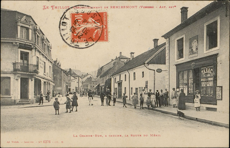 Carte postale ancienne Carte postale, Le Thillot, Arrondissement de Remiremont (Vosges), Alt. 497m, La Grande-Rue, à gauche, La Route du Ménil