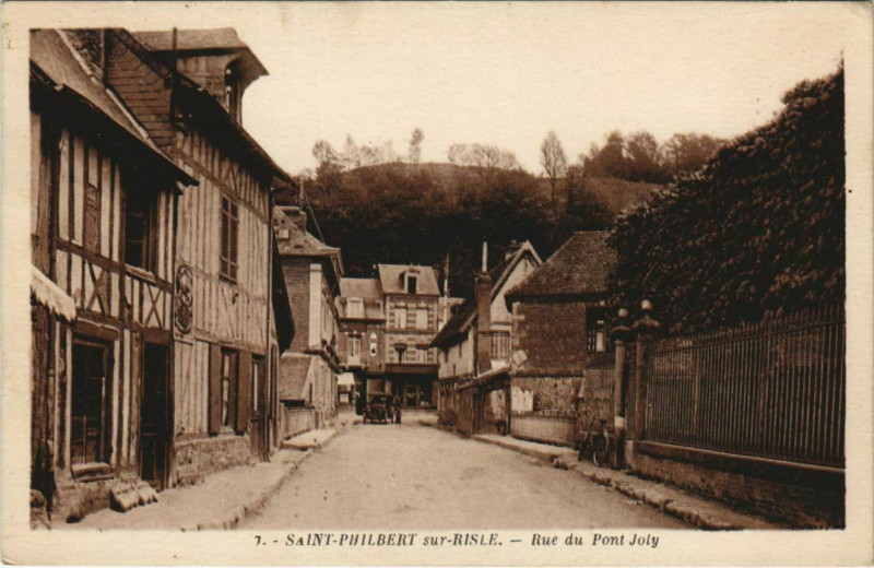 Carte postale ancienne Saint-Philbert-sur-Risle Rue du Pont Joly à Saint-Philbert-sur-Risle