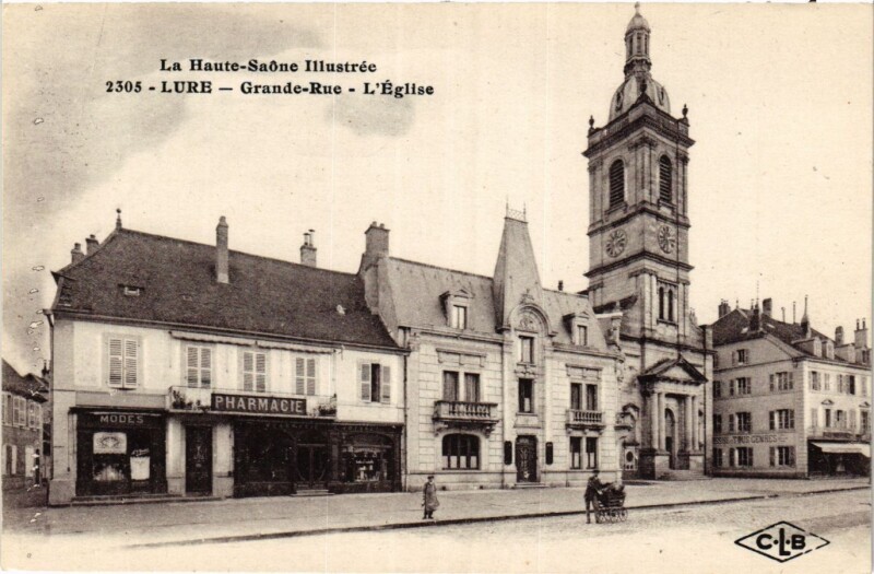 Carte postale ancienne Grande-Rue - L'Eglise à Lure