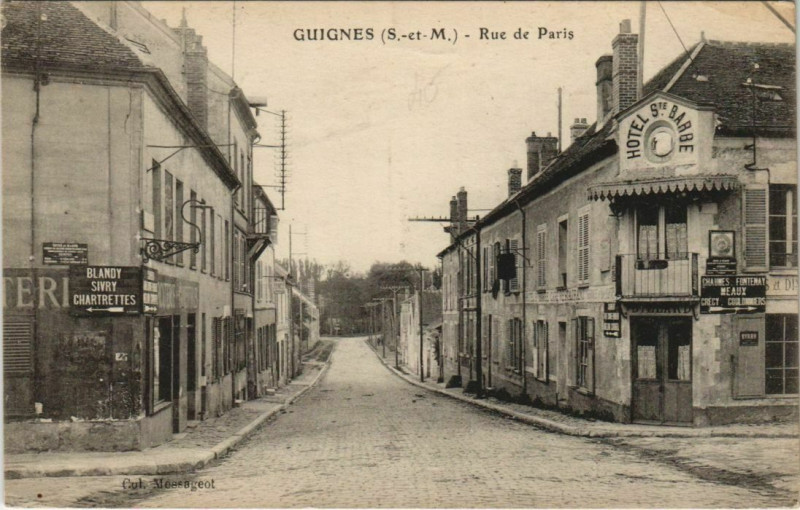 Carte postale ancienne Guignes-Rabutin Rue de Paris à Guignes