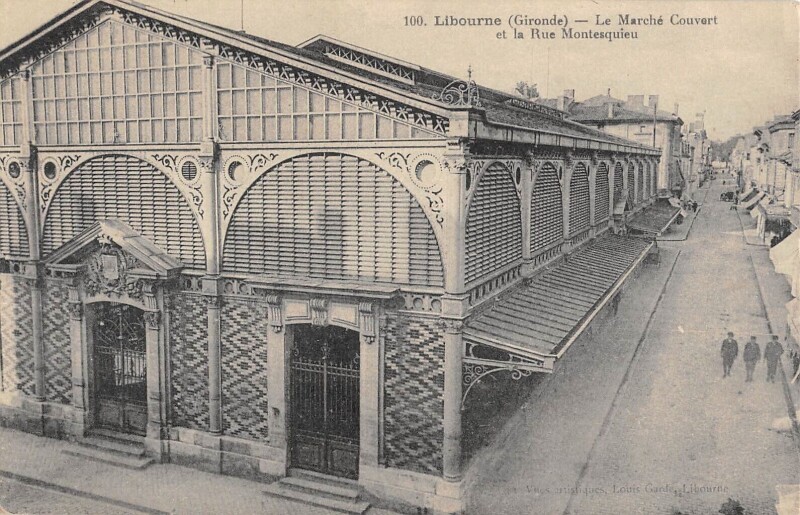 Carte postale ancienne Libourne Le Marche Couvert Et Rue Montesquieu à Libourne