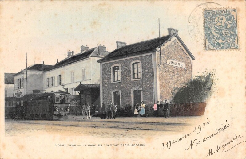 Carte postale ancienne Longjumeau / La Gare Du Tramway / Paris Arpajon / Train Dans La Rue à Longjumeau