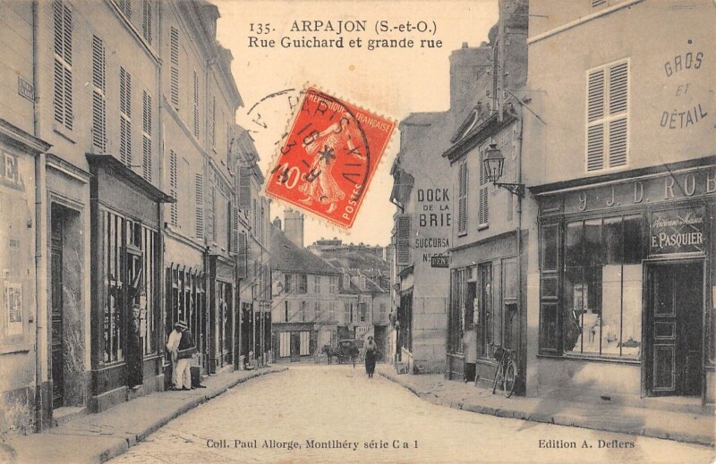 Carte postale ancienne Arpajon - Rue Guichard - Grande Rue à Arpajon