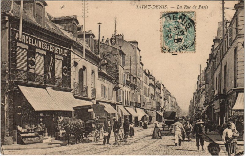 Carte postale ancienne Saint-Denis - La Rue de Paris à Saint-Denis