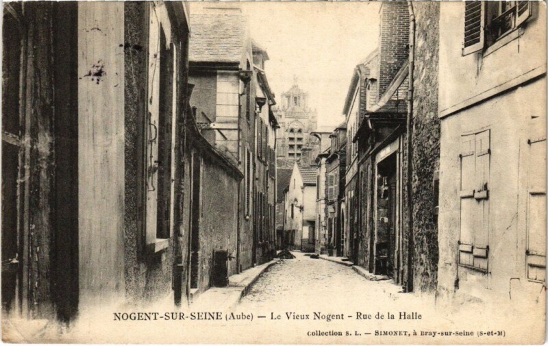 Carte postale ancienne Nogent-sur-Seine - Rue de la Halle à Nogent-sur-Seine