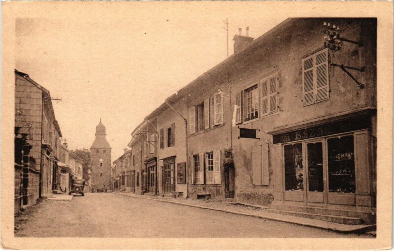 Carte postale ancienne Nozeroy- Grande Rue et Tour de l'Horloge France à Nozeroy