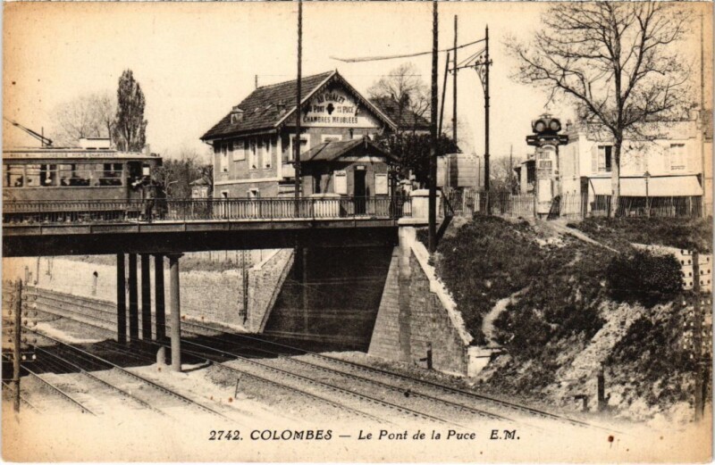Carte postale ancienne Colombes Le Pont de la Puce à Colombes