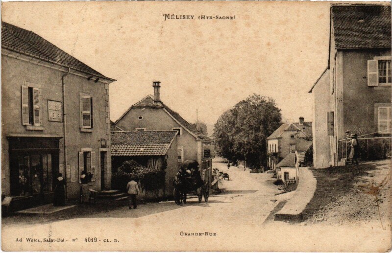 Carte postale ancienne Mélisey Grande Rue à Mélisey