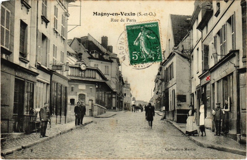 Carte postale ancienne Magny en Vexin Rue de Paris France à Magny-en-Vexin