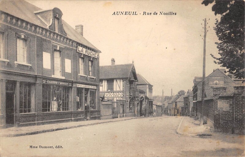 Carte postale ancienne Auneuil - Rue De Noailles - Alimentation La Ruche à Auneuil