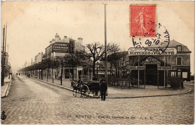 Carte postale ancienne Mantes Rue du Chemin de Fer