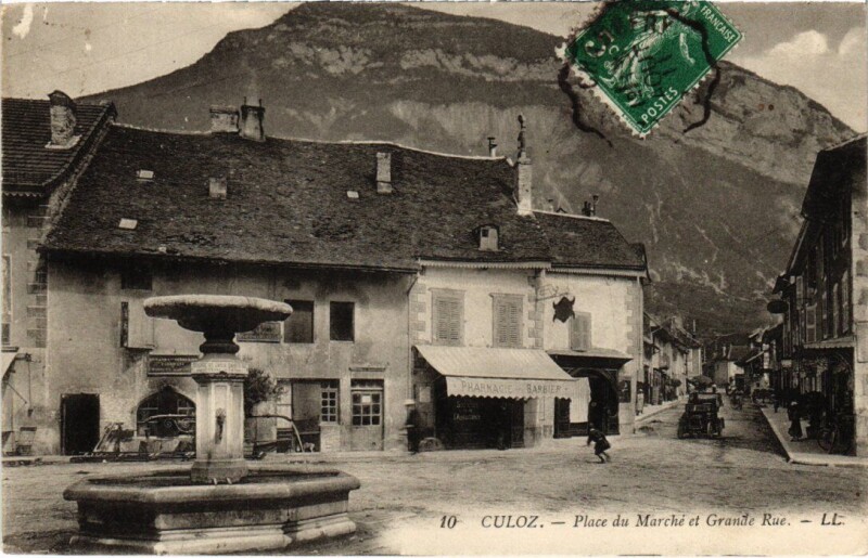 Carte postale ancienne Culoz Place du Marche et Grande Rue France à Culoz