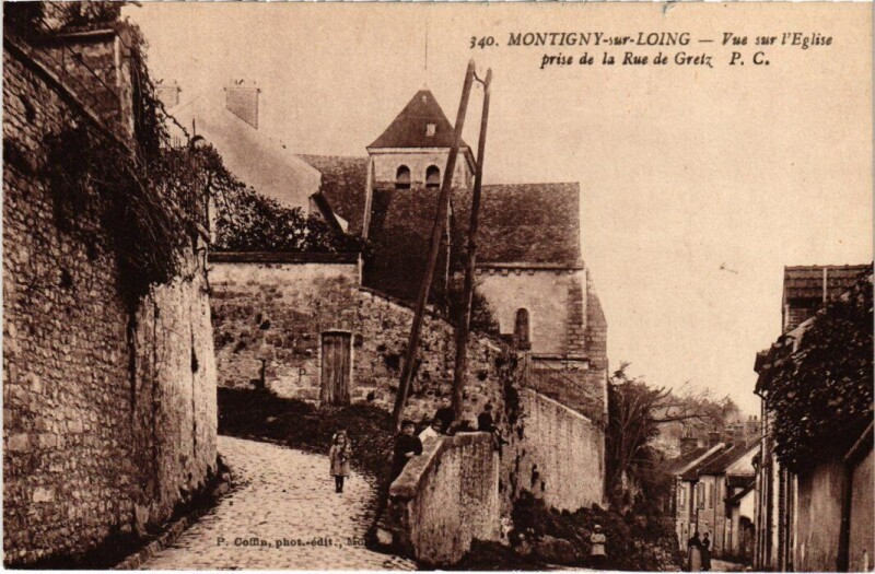Carte postale ancienne Montigny-sur-Loing Vue sur l'Eglise prise de la Rue de Gretz à Montigny-sur-Loing