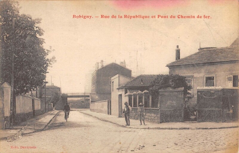 Carte postale ancienne Bobigny - Rue De La Republique Et Pont Du Chemin De Fer à Bobigny
