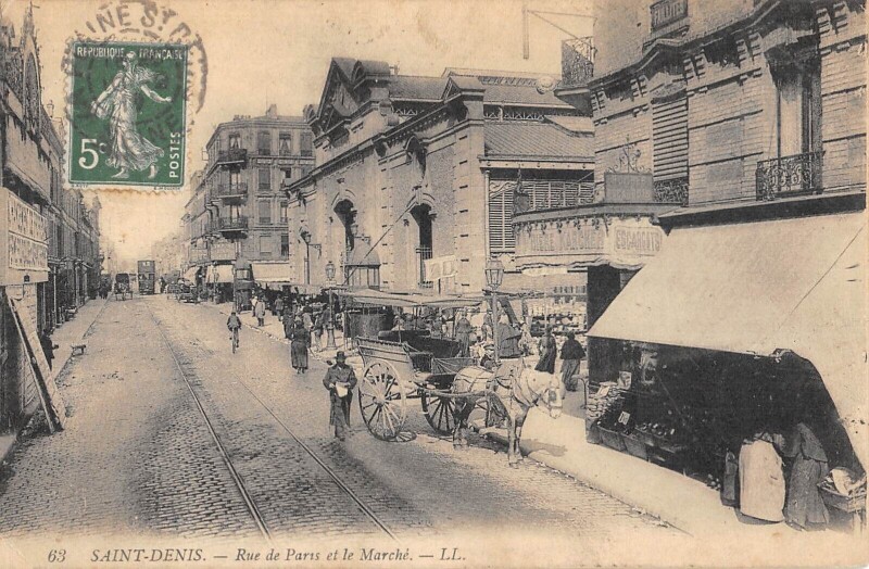 Carte postale ancienne Saint Denis / La Rue De Paris / Marche à Saint-Denis
