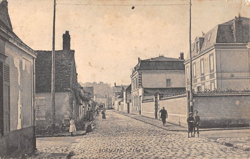 Carte postale ancienne Lormaye - Une Rue à Lormaye