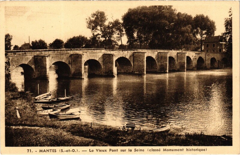 Carte postale ancienne Mantes-la-Jolie Le Vieux Pont sur la Seine à Mantes-la-Jolie