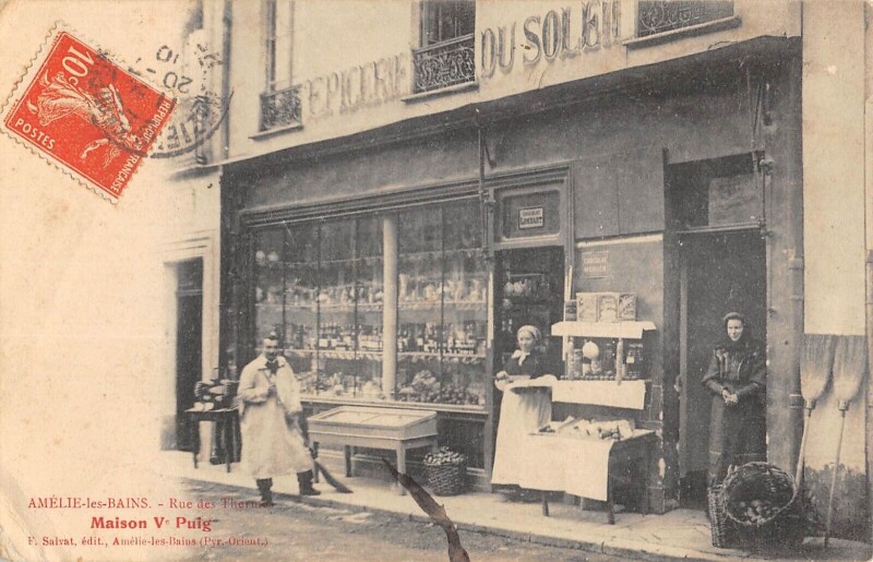 Carte postale ancienne Amelie Les Bains - Maison V.puig - Epicerie Du Soleil - Rue Des Thermes