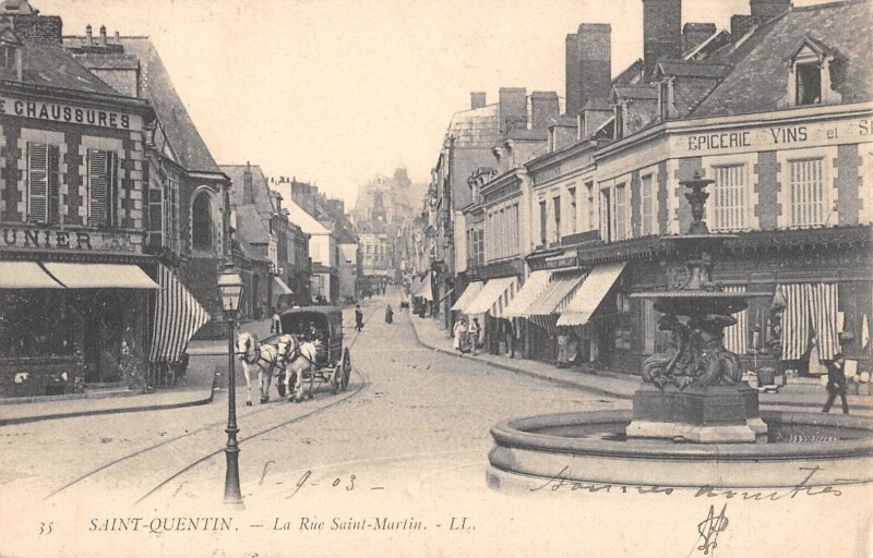 Carte postale ancienne Saint Quentin - La Rue Saint Martin à Saint-Quentin