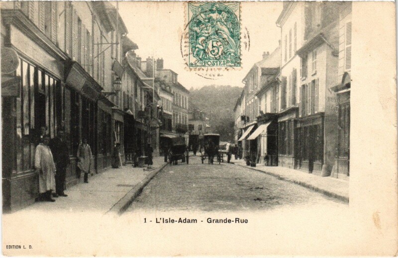 Carte postale ancienne L'Isle-Adam Grande Rue à L'Isle-Adam