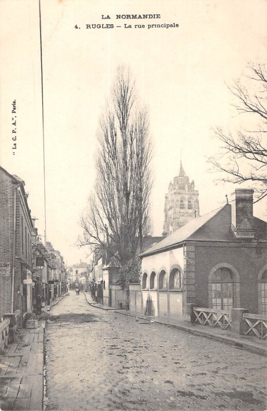 Carte postale ancienne Rugles - La Rue Principale à Rugles