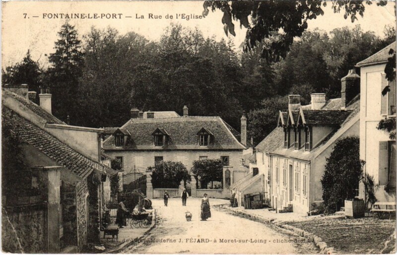 Carte postale ancienne Fontaine-le-Port - La Rue de l'Eglise à Fontaine-le-Port