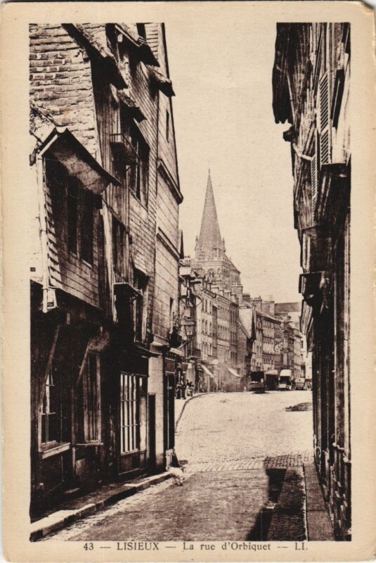 Carte postale ancienne Lisieux La Rue d'Orbiquet à Lisieux