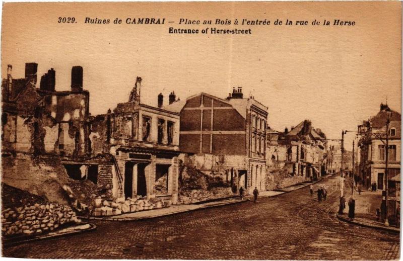 Carte postale ancienne Ruines de Cambrai - Place au Bois a l'entrée de la rue de la à Cambrai