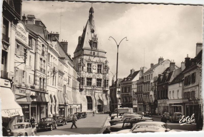 Carte postale ancienne Dreux La Grande Rue Maurice - Violette et le Beffroi construit sou à Dreux