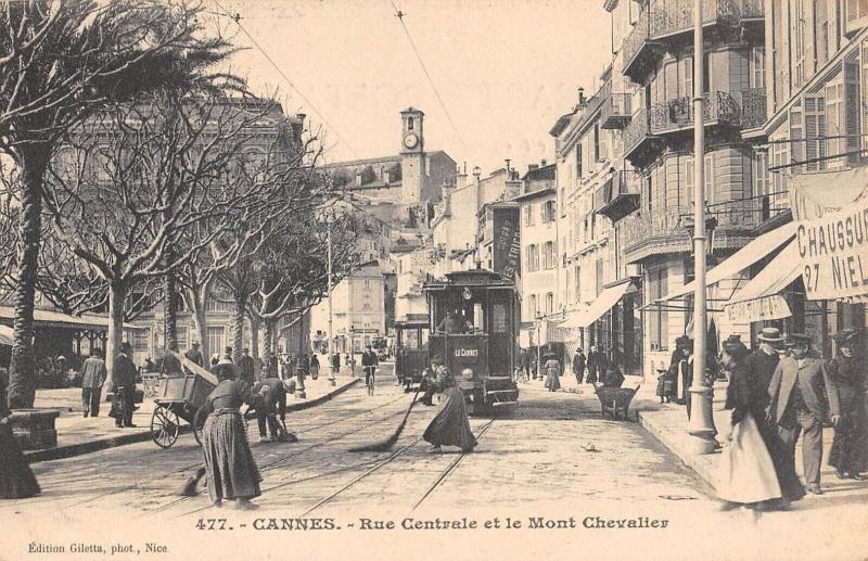 Carte postale ancienne Cannes - Rue Centrale Et Le Mont Chevallier - Tramway à Cannes