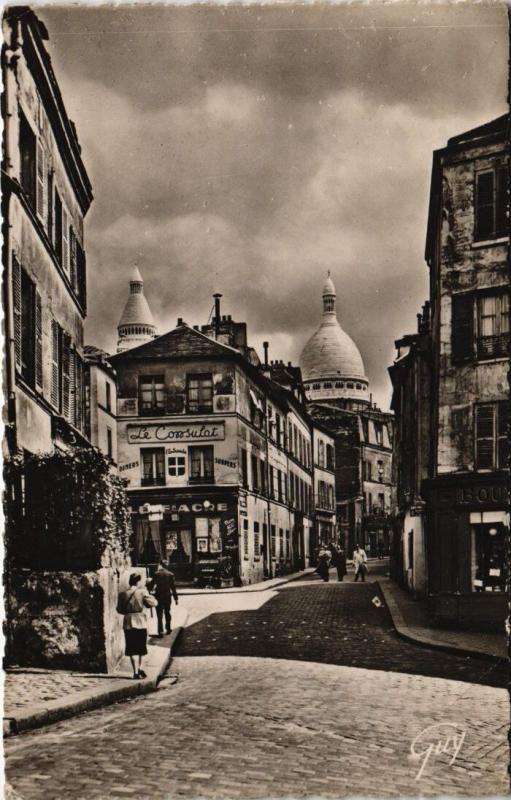 Carte postale ancienne La place Jean-Baptiste-Clément, la rue Norvins, et, au fond, de gauche à droite : le campanile et le dôme du Sacré-Coeur à Paris 18e