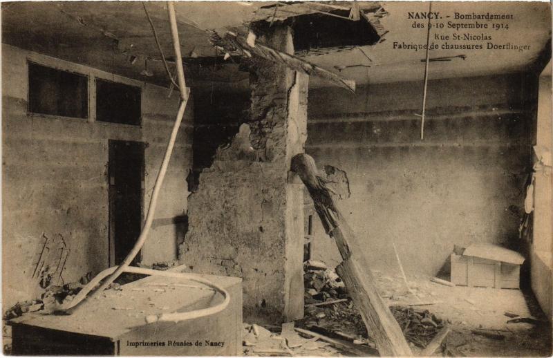 Carte postale ancienne Nancy bombardement Rue Saint-Nicolas à Nancy