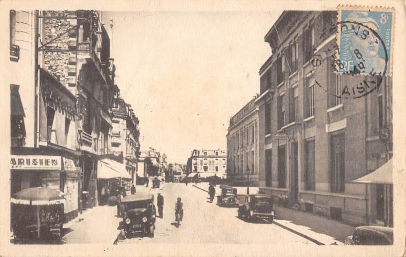 Carte postale ancienne Soissons - Rue Saint Martin - La Poste Et Le Tribunal à Soissons